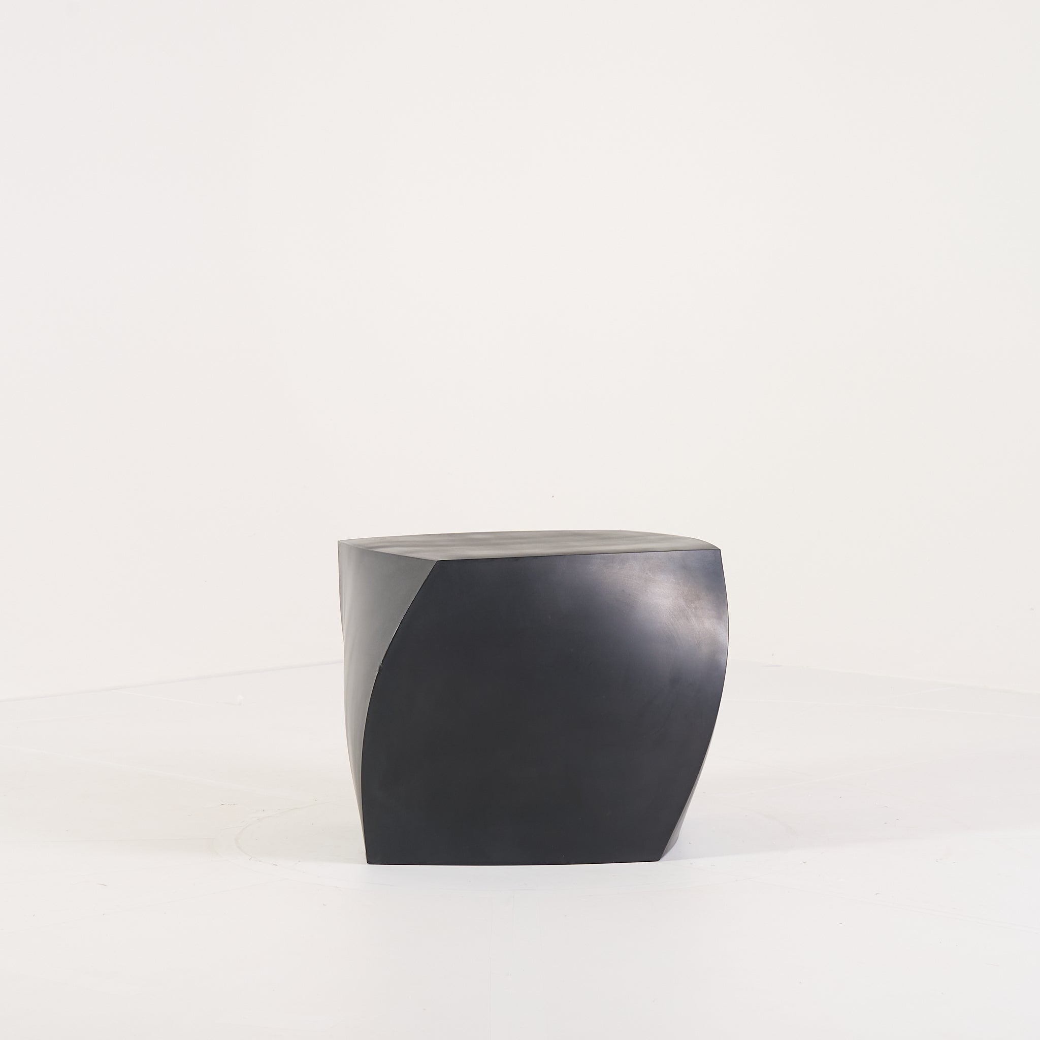 Gehry Left Twist Cube by Heller in Black | Well Loved – Fair | Shop Now | MO-HLR-1016_06-1403-Hero Image-2