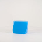 Gehry Left Twist Cube by Heller in Blue | Well Loved – Fair | Shop Now | MO-HLR-1016_05-1397-Hero Image-1
