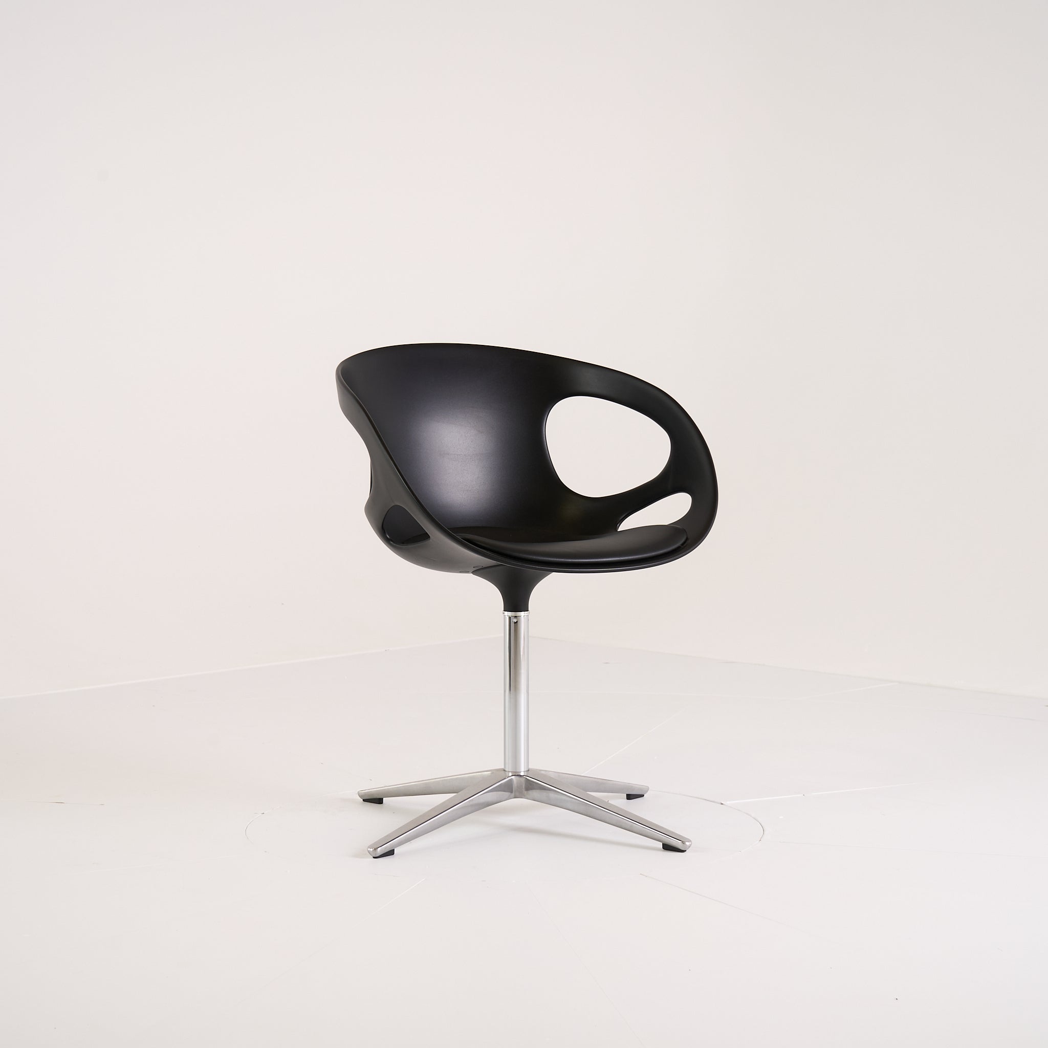 Rin by Fritz Hansen in Black Leather / Fixed Seat / 4-Star Stainless Base | Gently Used – Good | Shop Now | MO-FHA-HK10-70-Hero Image-7