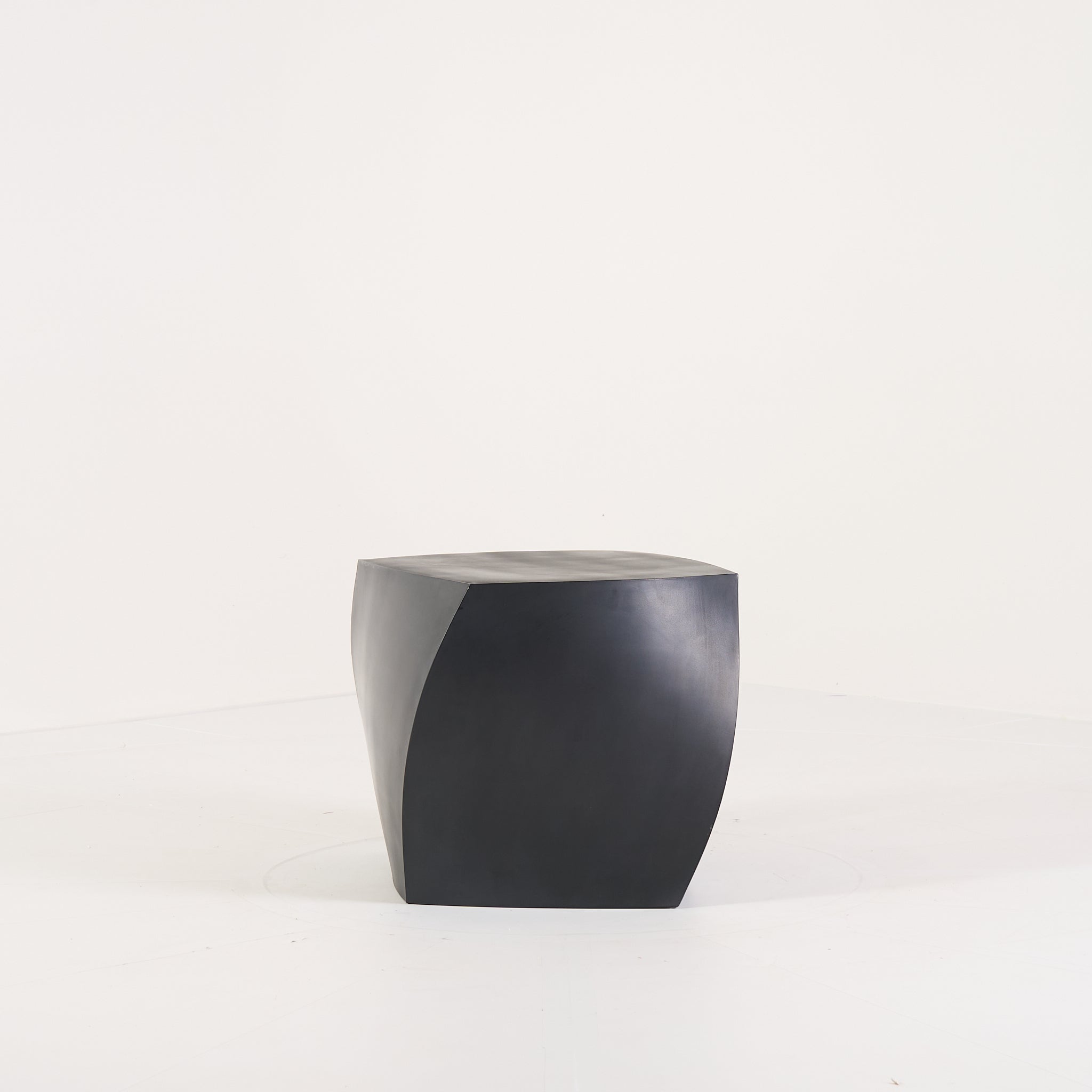 Gehry Left Twist Cube by Heller in Black | Well Loved – Fair | Shop Now | MO-HLR-1016_06-1402-Hero Image-1