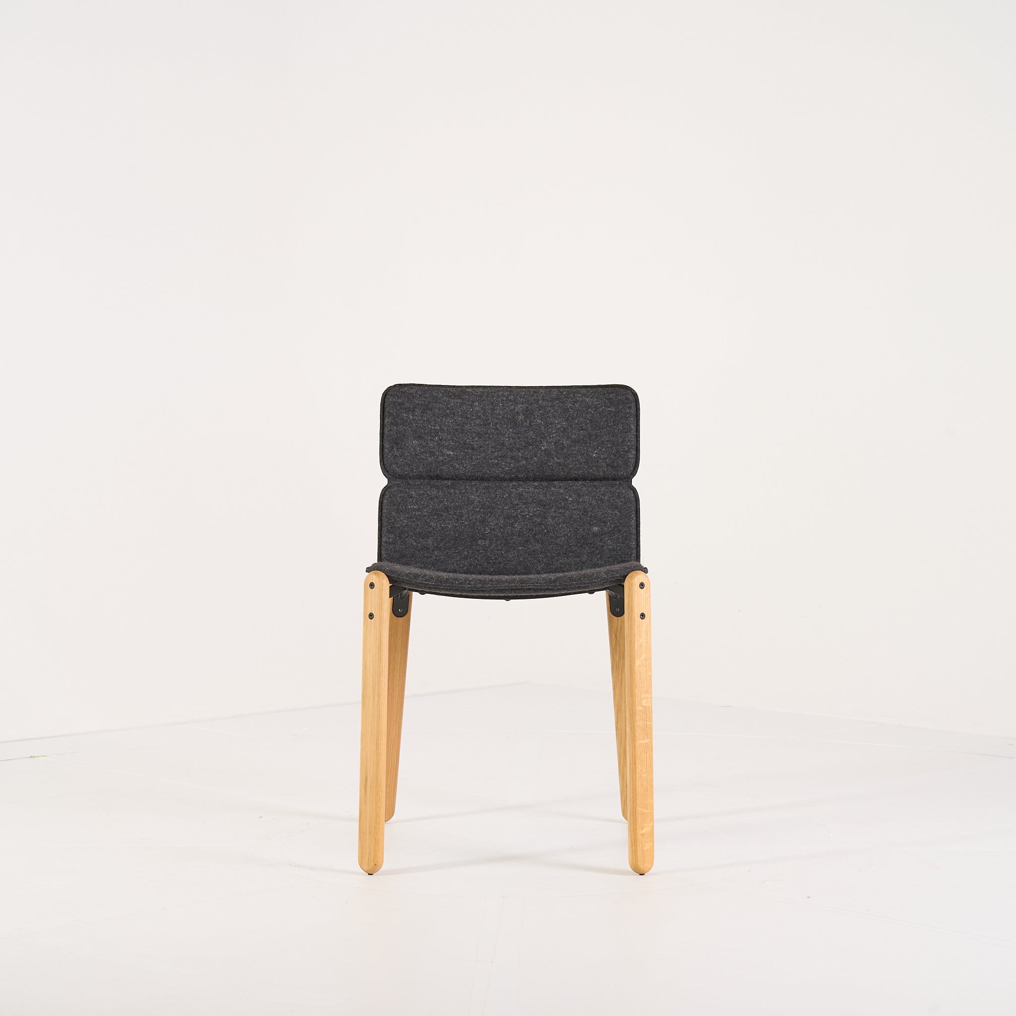 Paddock Chair by Ligne Roset in Feutre Anthracite | Floor Sample – Very Good | Shop Now | MO-LIR-10260880-1411-Hero Image-1