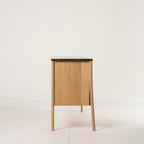Jut Cabinet by Fritz Hansen in Black Marble / Oak | Project Piece – As-Is | Shop Now | MO-FHA-1090101-106-Hero Image-1
