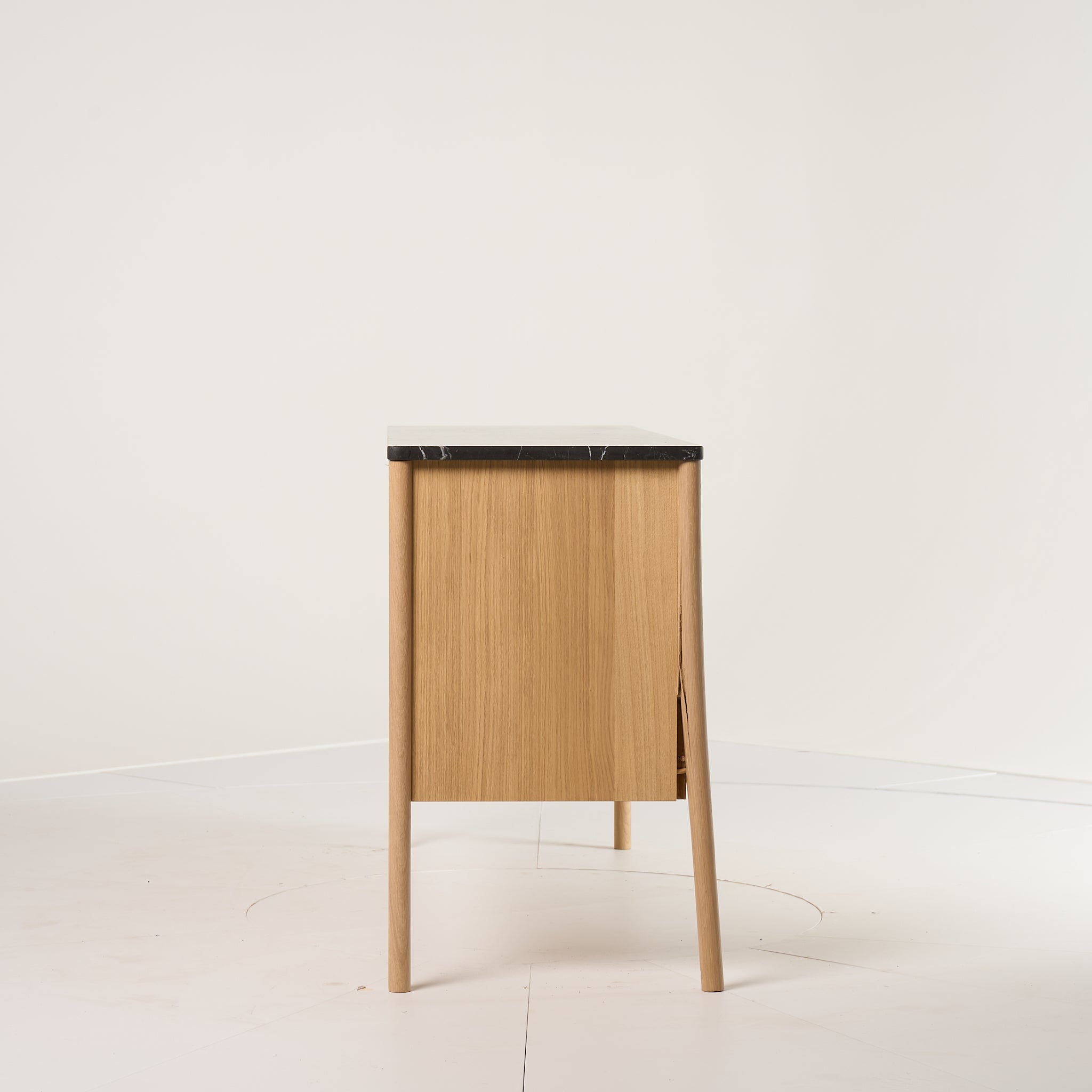 Jut Cabinet by Fritz Hansen in Black Marble / Oak | Project Piece – As-Is | Shop Now | MO-FHA-1090101-106-Hero Image-1