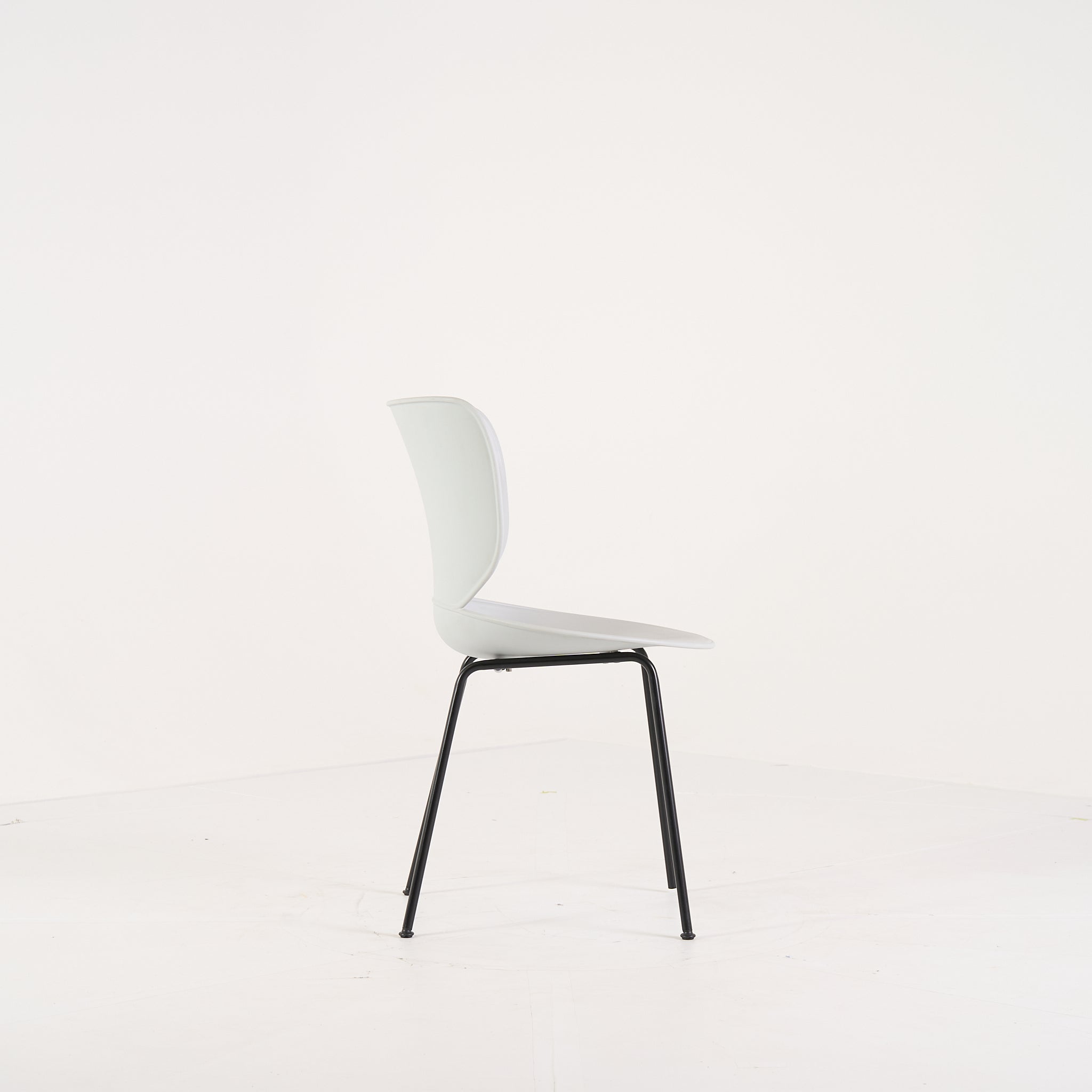 Hana Chair Un-Upholstered  by Moooi in Concrete Grey / Non-Stackable Black Legs | Project Piece – As-Is | Shop Now | MO-MOO-8718282380315-1444-Hero Image-3