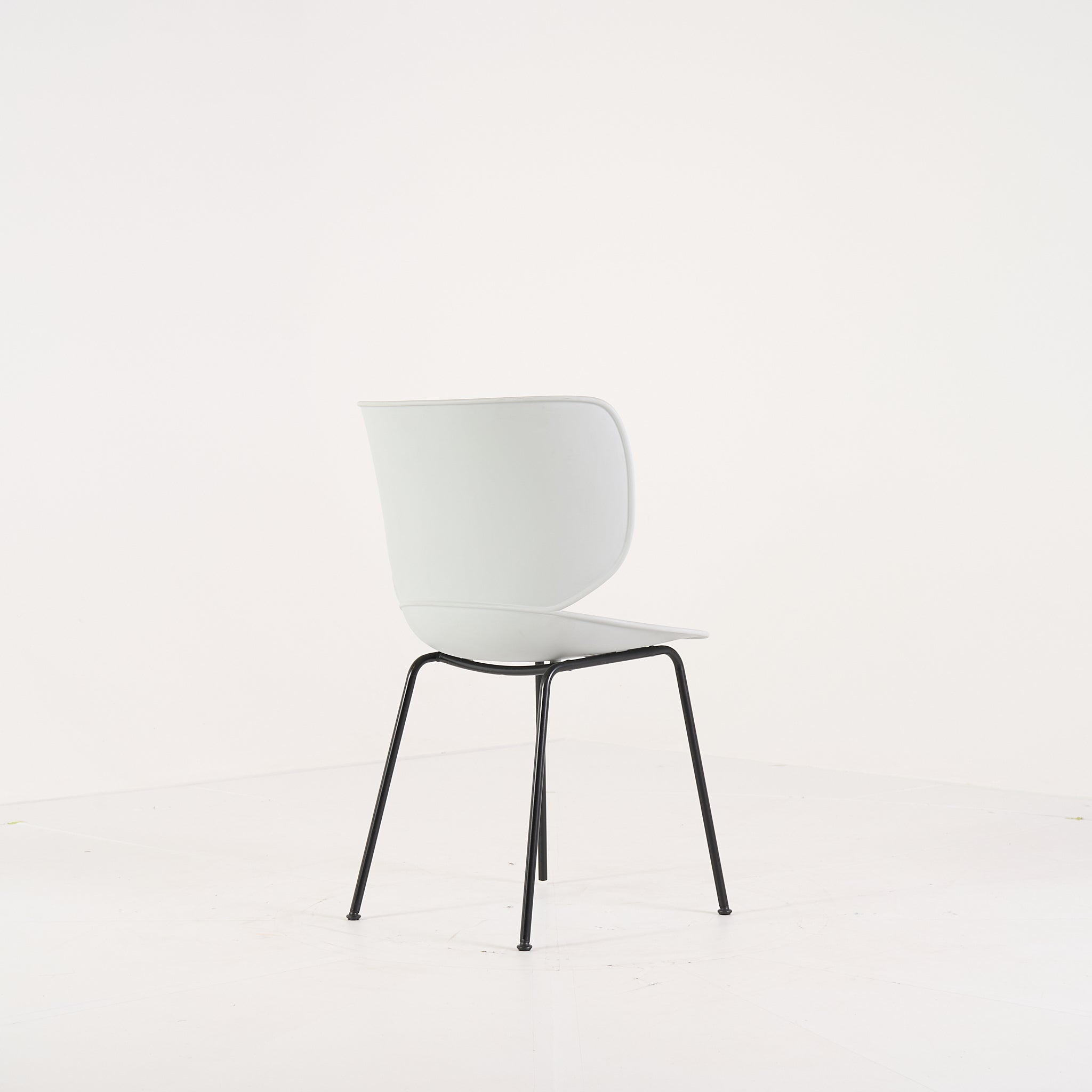 Hana Chair Un-Upholstered  by Moooi in Concrete Grey / Non-Stackable Black Legs | Project Piece – As-Is | Shop Now | MO-MOO-8718282380315-1444-Hero Image-4