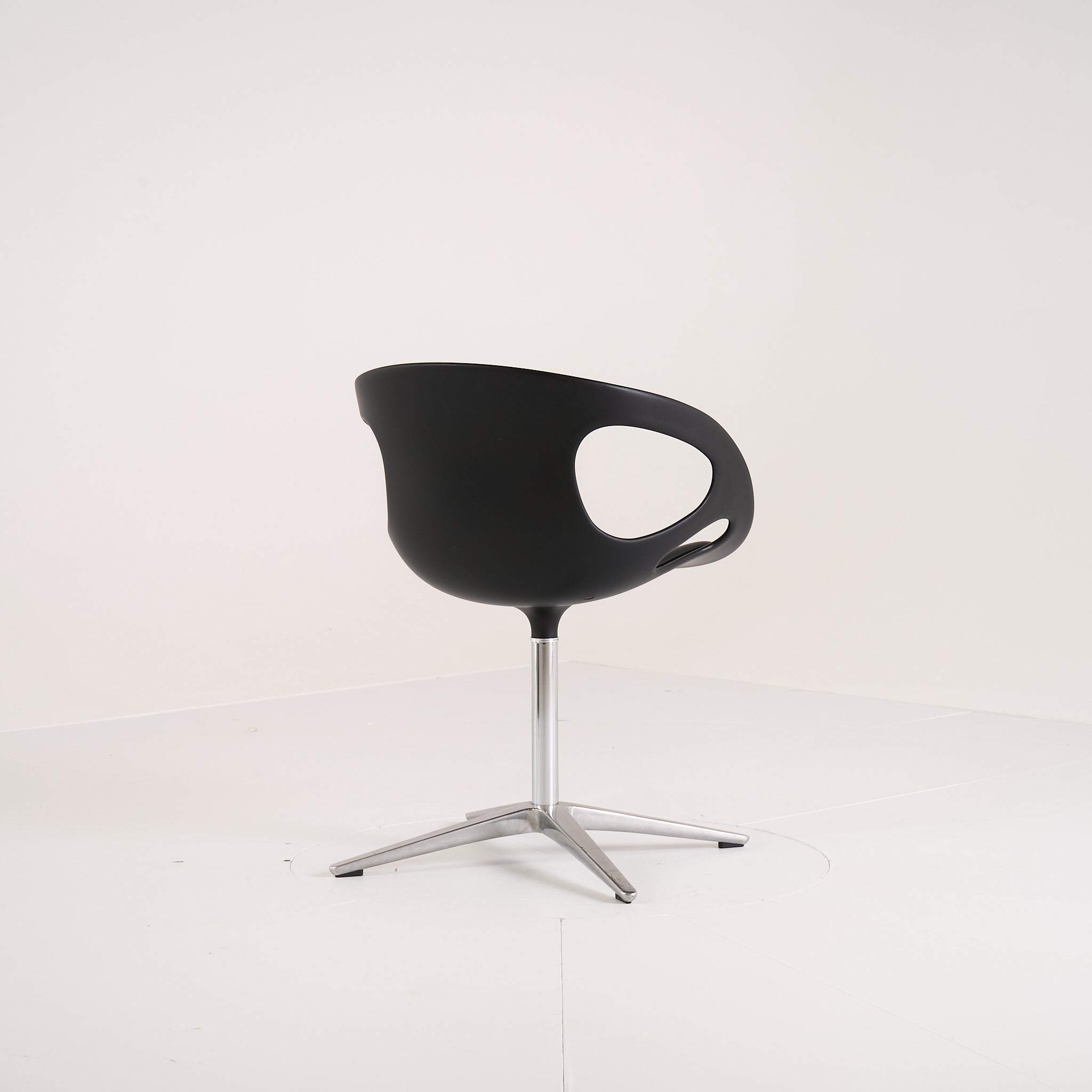 Rin by Fritz Hansen in Black Leather / Fixed Seat / 4-Star Stainless Base | Gently Used – Good | Shop Now | MO-FHA-HK10-70-Hero Image-1