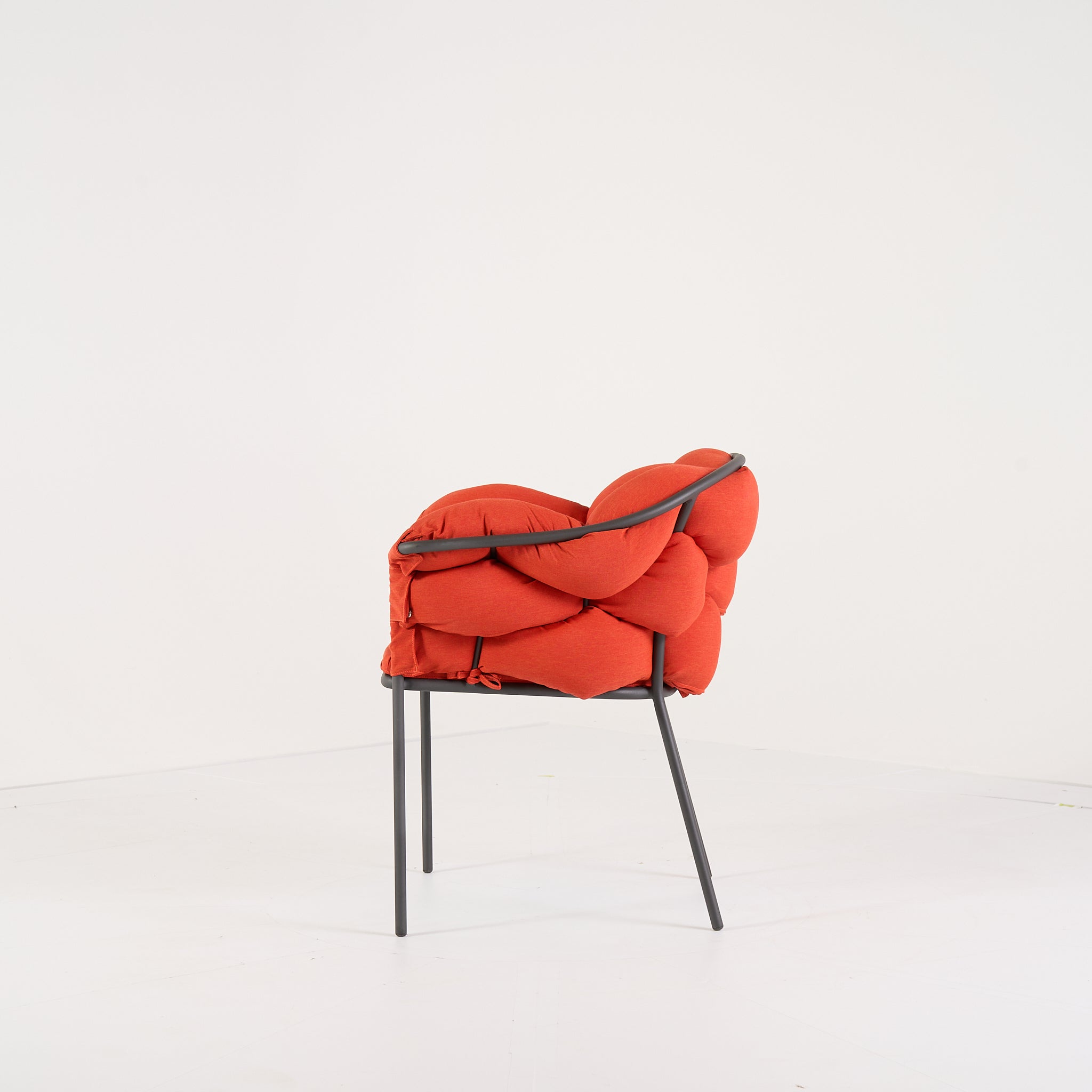 Serpentine Chair with Arms by Ligne Roset in Outdoor, Terra Cotta Fabric | Floor Sample – Very Good | Shop Now | MO-LIR-10262093-1165-Hero Image-6