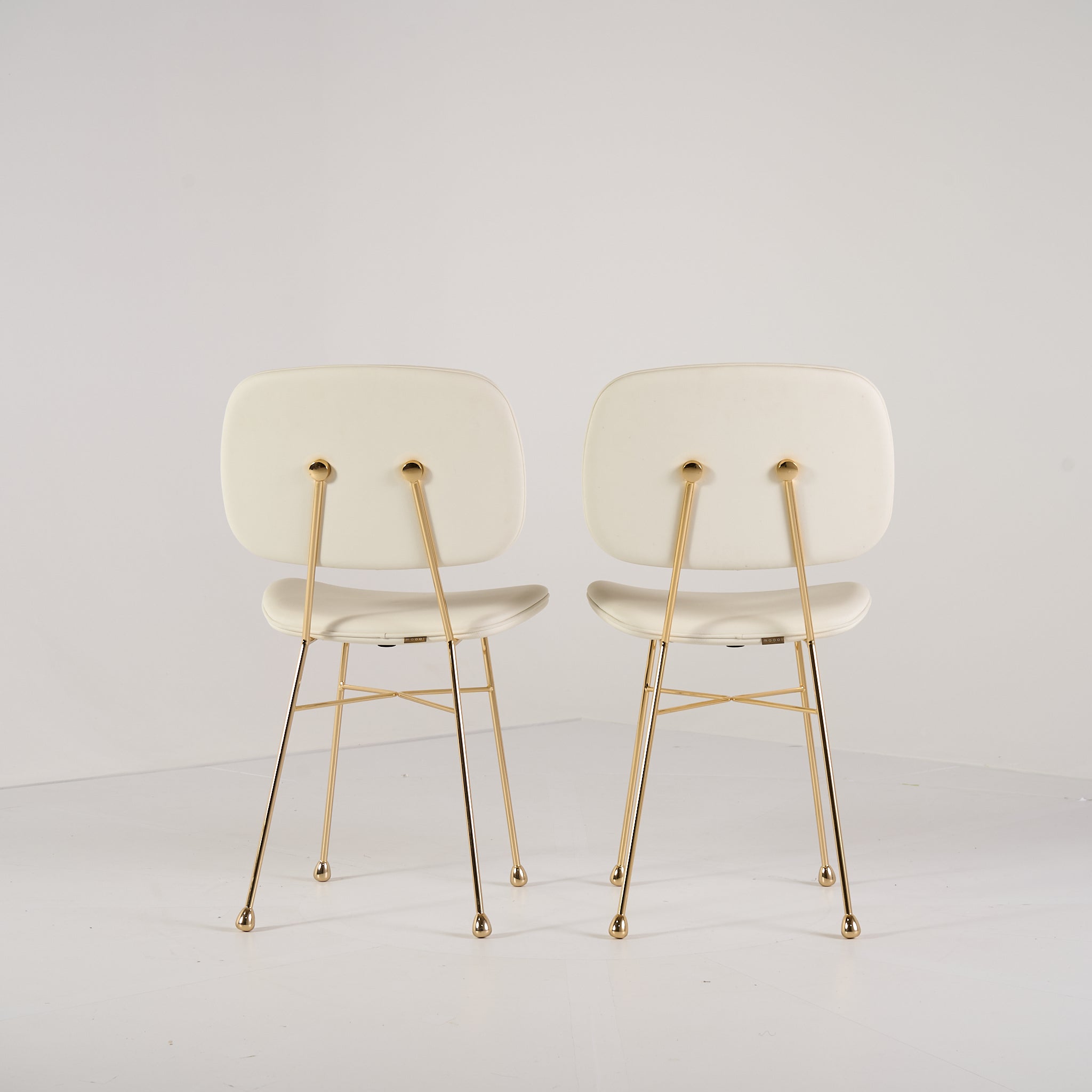 Golden Chair (Set of 2) by Moooi in Custom White Leather | Well Loved – Fair | Shop Now | MO-MOO-8718282773896-170-Hero Image-3