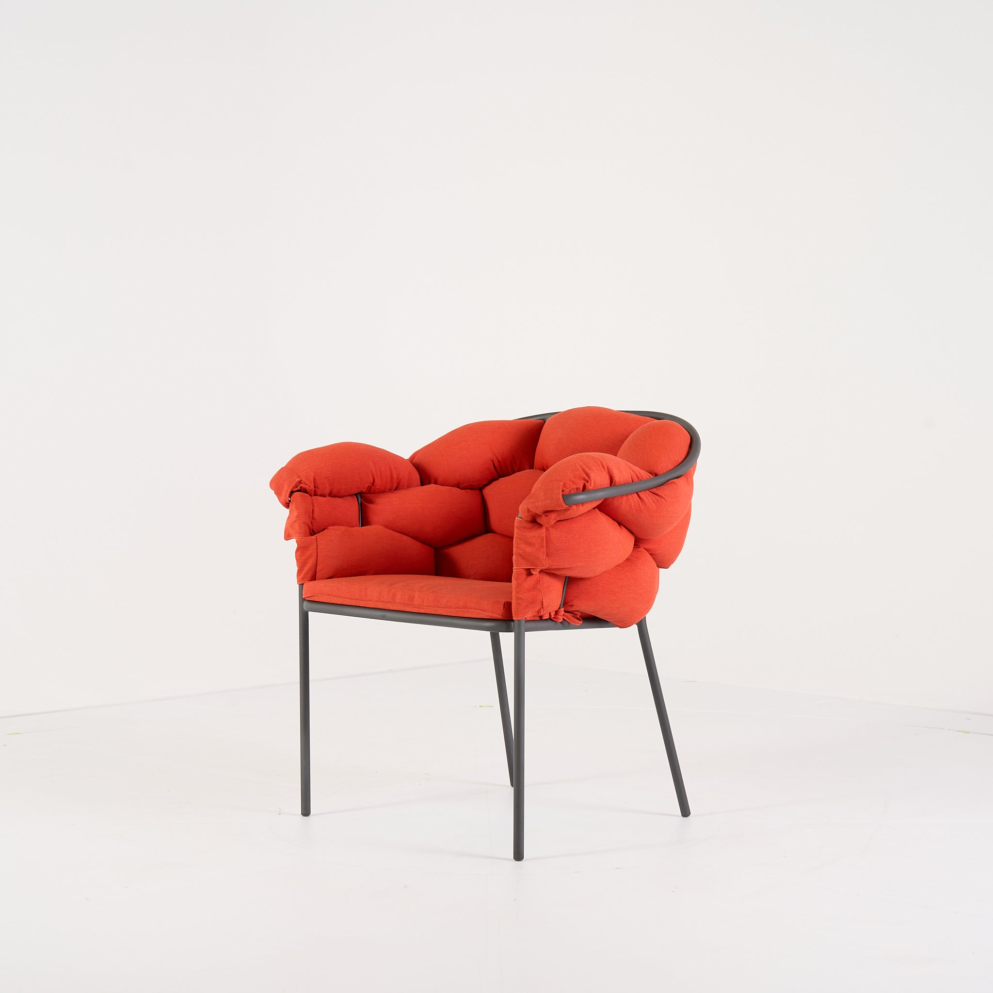 Serpentine Chair with Arms by Ligne Roset in Outdoor, Terra Cotta Fabric | Floor Sample – Very Good | Shop Now | MO-LIR-10262093-1165-Hero Image-3